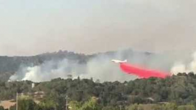 Evacuated Family Watches Giant 747 Drop Retardant Over California Wildfires