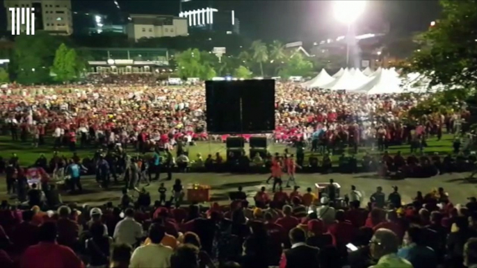 Crowd listening to speeches at opposition rally