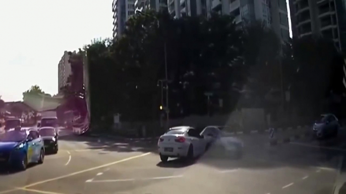 Bizarre moment 'ghost car' appears out of nowhere to cause crash