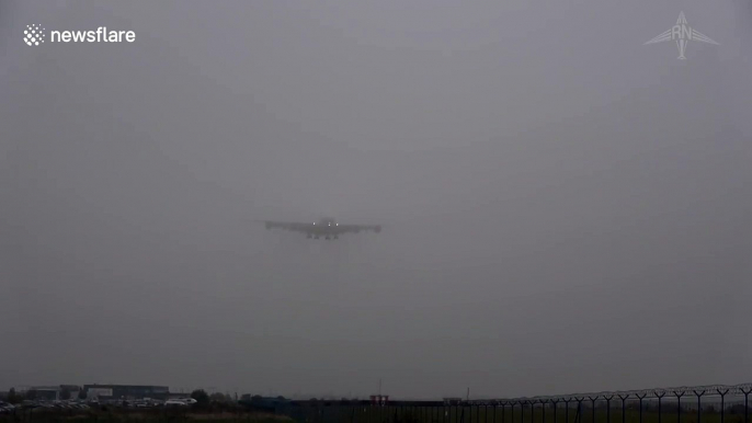 Plane appears from nowhere to land in thick Prague fog