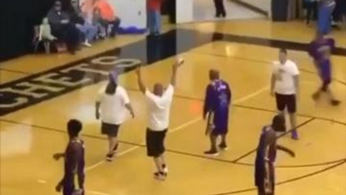 Harlem Wizards break backboard with a dunk