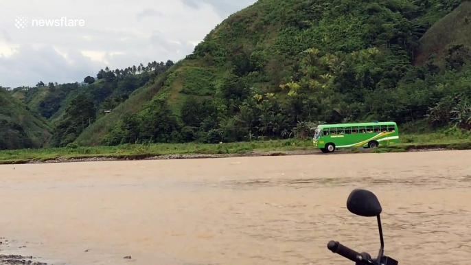 School bus driver takes risky shortcut through flooded river