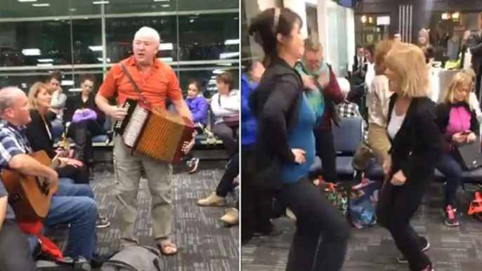 Newfoundland flight passengers turn delayed flight into huge sing-a-long At Toronto airport