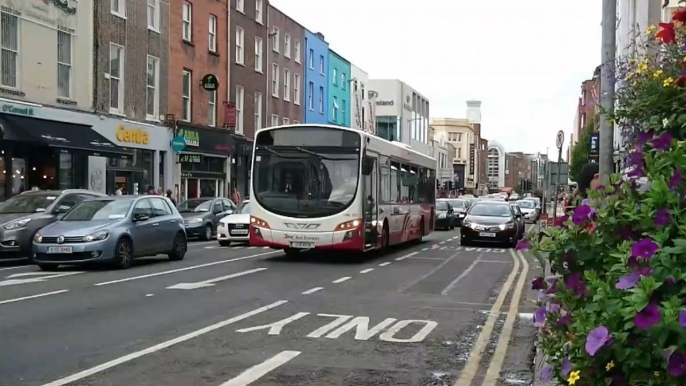 Single Deck Bus Eireann buses at Roches St/O'Connell St, Limerick Town Centre, Ireland - August 2017