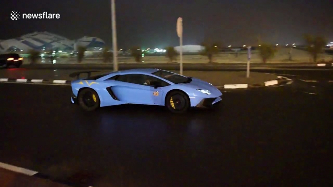 Lamborghini driver does donut in puddle