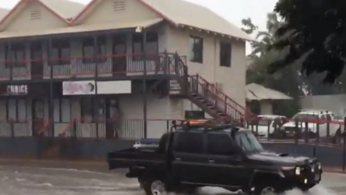 Motorists Drive Through Floodwaters in Broome