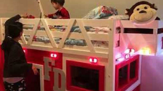 Little Boy Is Delighted by His New Fire Truck Bed