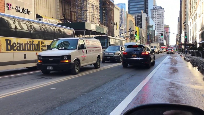 2 UNIDENTIFIABLE LAW ENFORCEMENT SUV'S RESPONDING AGAINST TRAFFIC ON W. 34TH ST. IN MANHATTAN, NYC.