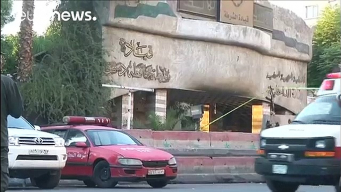 ISIL suicide bombers kill two police officers in Damascus