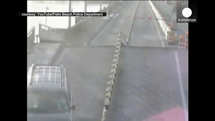 Distracted driver accidently jumps opening drawbridge, Florida
