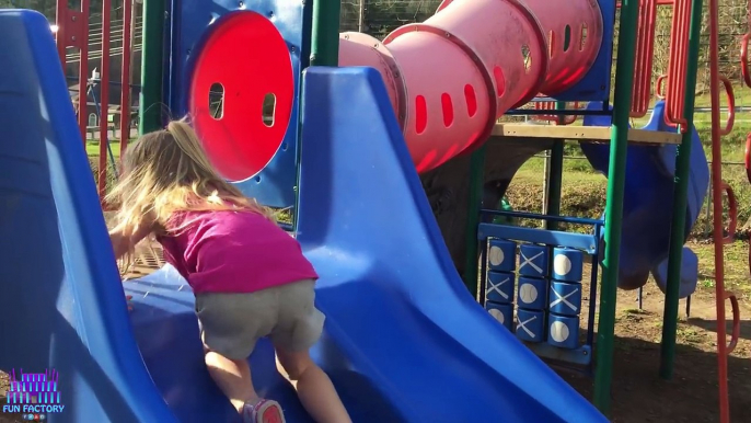 Playing at the Park on the Playground for Kids & Children on Slides, Swings