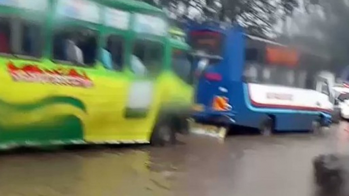 Cars Move Through Flooded Streets During Rush Hour Flooding in Nairobi