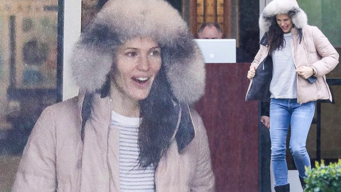 No umbrella needed! Jennifer Garner shields herself from the rain in furry hooded coat as she runs errands