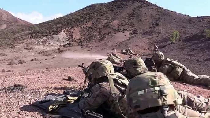 U.S. Army Soldiers Price With Guns In East Africa