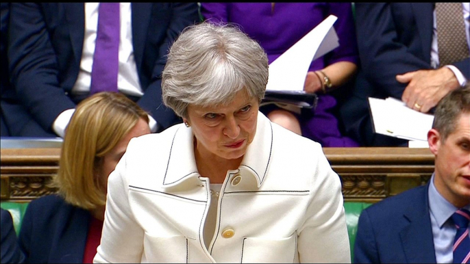 May defends Syria strikes in the face of criticism