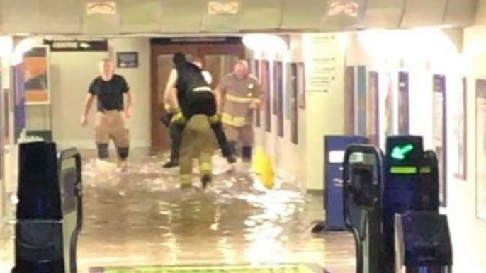 Firefighters Carry Commuters Out of Flooded Didcot Parkway Station