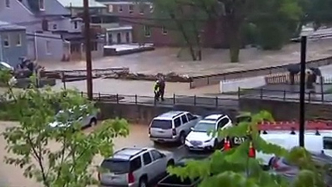 Raging floods swept through Ellicott City, Maryland, USA, on May 27 after heavy rains soaked the area, leaving cars submerged, and homes and streets flooded. A