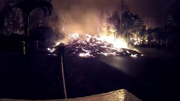 Lava flow from the erupting Kilauea volcano continues to destroy trees and houses in Pahoa, #Hawaii, US on May 24, 2018. The volcano has charred about 2,200 acr