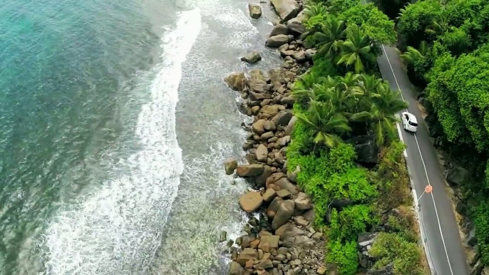 Surfing video shot in the Seychelles using a drone. Surfing is one of the series of action adventure activities available in the Seychelles Islands.Video prod