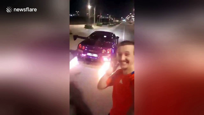 Customised Nissan GTR spits crazy exhaust flames on Qatar street