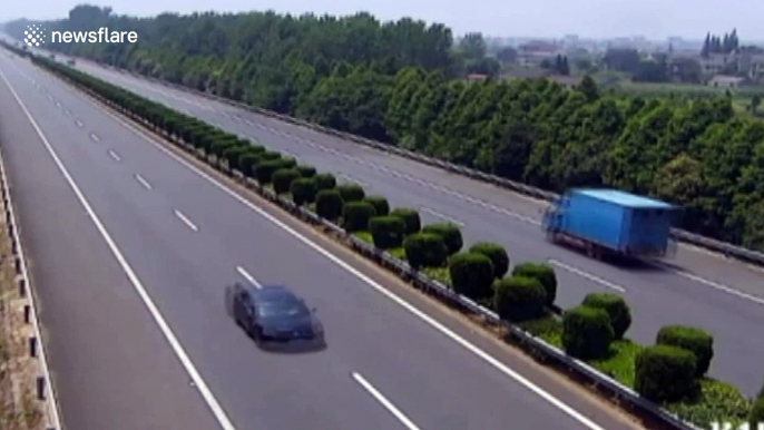 Lorry flips over on motorway after being rear-ended by speeding car