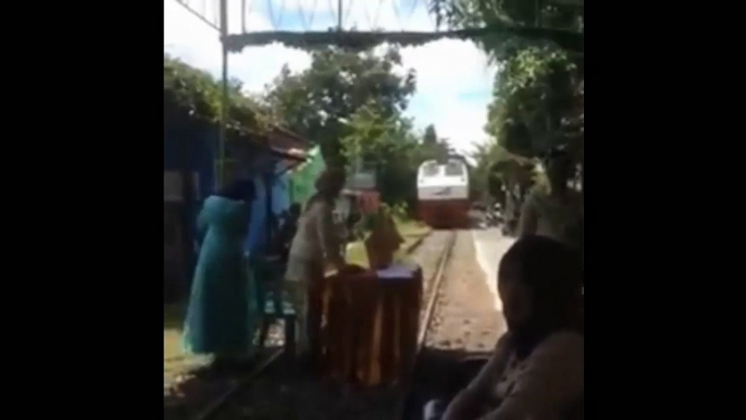 Indonesian Weeding party on a rail Track Insane