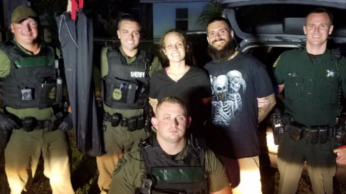 Fugitive Couple Smiles for Photo With Florida Police After Car Chase