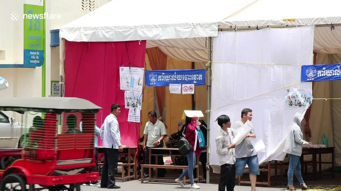 Cambodians prepare polling booths for 'sham' elections