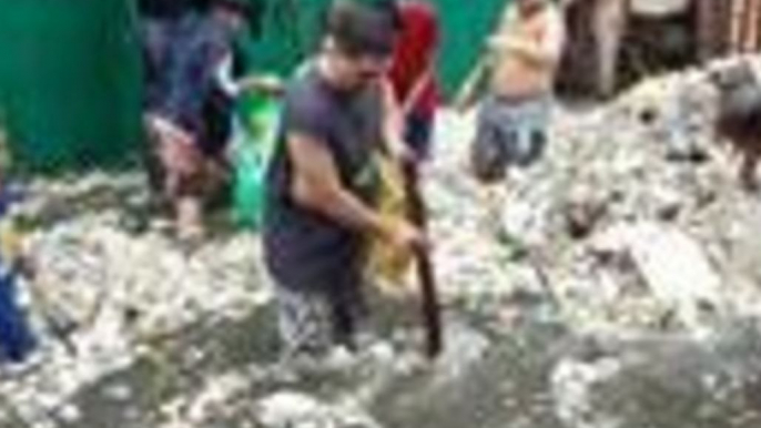 Torrential Rain Brings Flooding – and Garbage – to Philippine City of Navotas