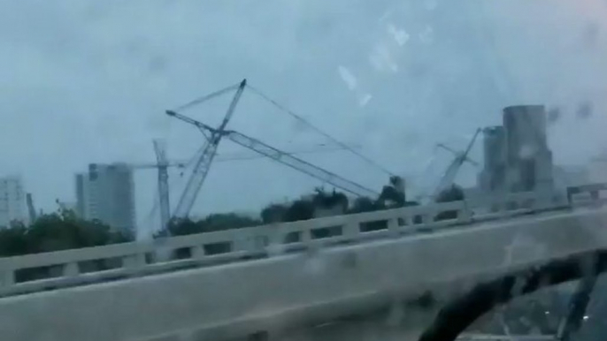 Construction Crane Seen Toppled Over in Miami