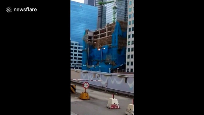 Scaffolding on building falls apart after Typhoon Mangkhut hits Hong Kong