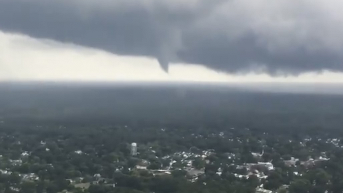 Plane Passenger's Video Shows Funnel Cloud Forming as Multiple Tornadoes Hit Virginia