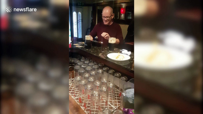 Pub-goer performs incredible trick with pint of Guinness and packet of crisps