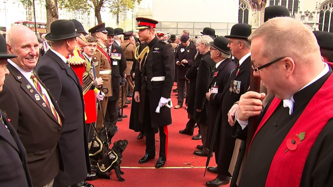 Prince Harry lays Cross of Remembrance at Westminster Abbey