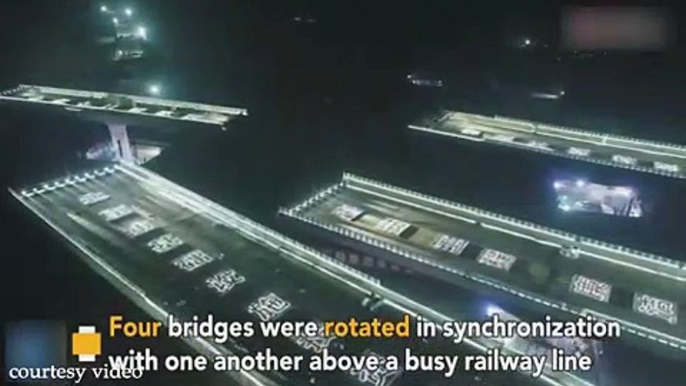 Four Bridges Rotate Simultaneously Above Busy Rail Line