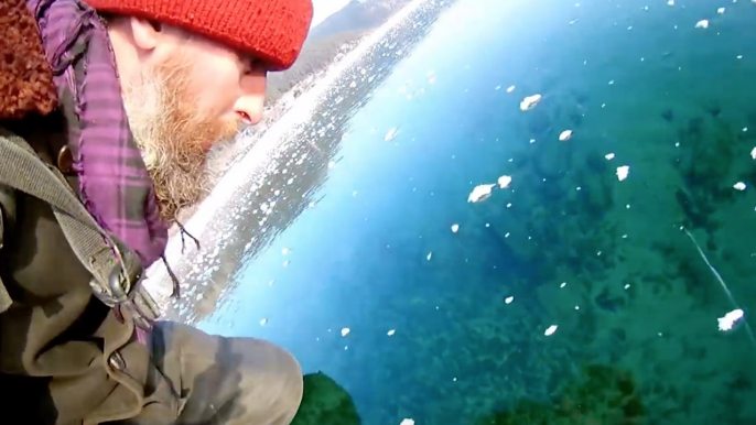 Man Films Mesmerizing Walk Across Ice On World’s Deepest Lake