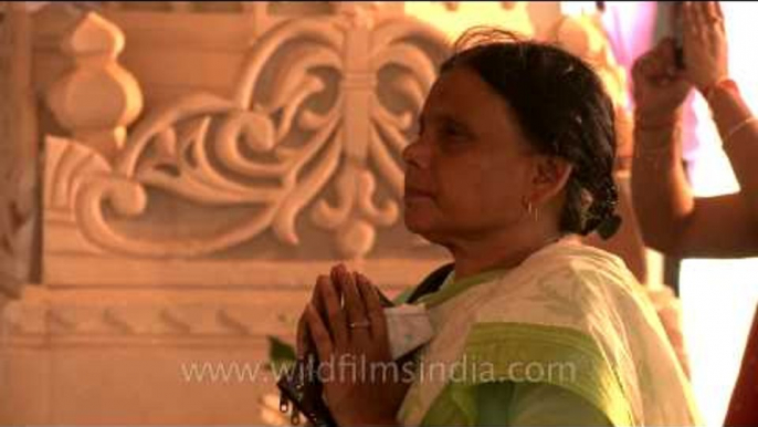 Devotees offering prayer to goddess Durga on Durga Navmi