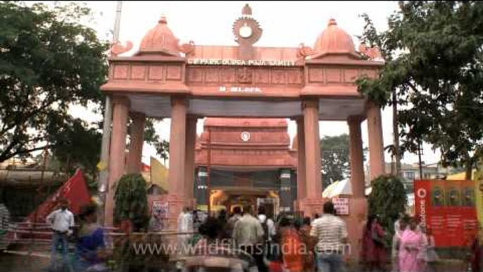 Devotees in quick motion at CR Park Durga puja pandal