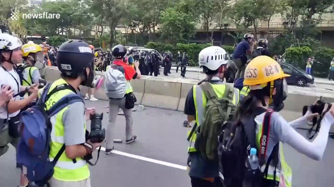 Hong Kong police baton-charge protesters In Ngau Tau Kok district during latest protests