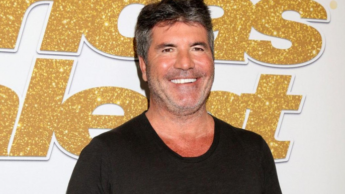 Simon Cowell wants son Eric to start work at ten