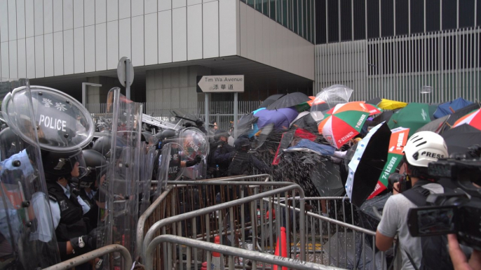 Hong Kong police chief declares anti-extradition bill protests a 'riot', raising stakes for those arrested