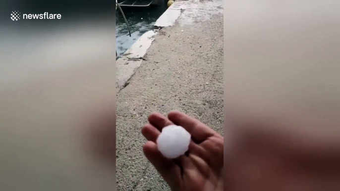 German tourist captures golf ball sized hail battering Italian city