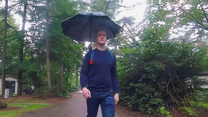 This backpack umbrella lets you walk hands-free in the rain — Future Blink