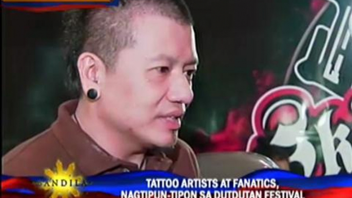 Artists, fans flock tattoo festival