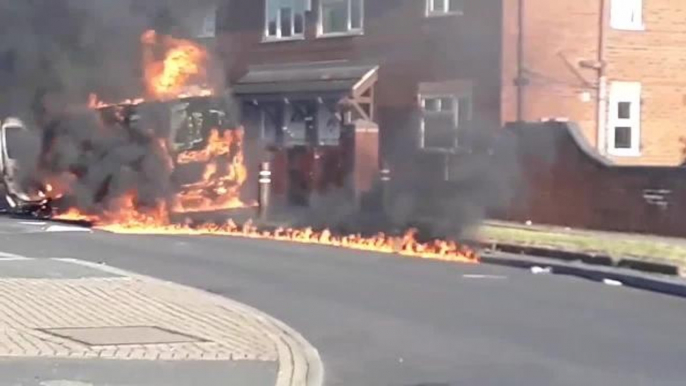 A 13-year-old boy arrested and a man charged after a van was set on fire in Halton Moor