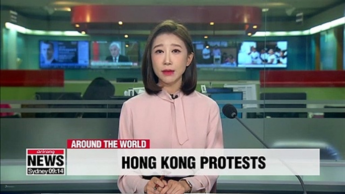 Protesters in Hong Kong hold unauthorized march in opposition to anti-mask law