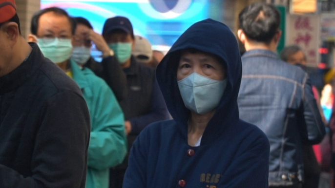 Face masks rationed in Macau and Taiwan amid coronavirus outbreak