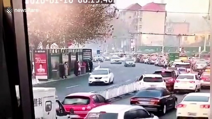 Car smashes into bus stop, injuring four people after colliding with another vehicle in China