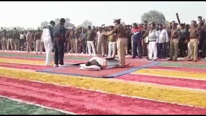 Indian police officer lets vehicles drive over his stomach