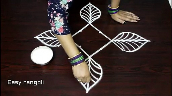 beautiful rangoli designs with 4x2 dots    simple muggulu rangoli designs with dots    kolam designs